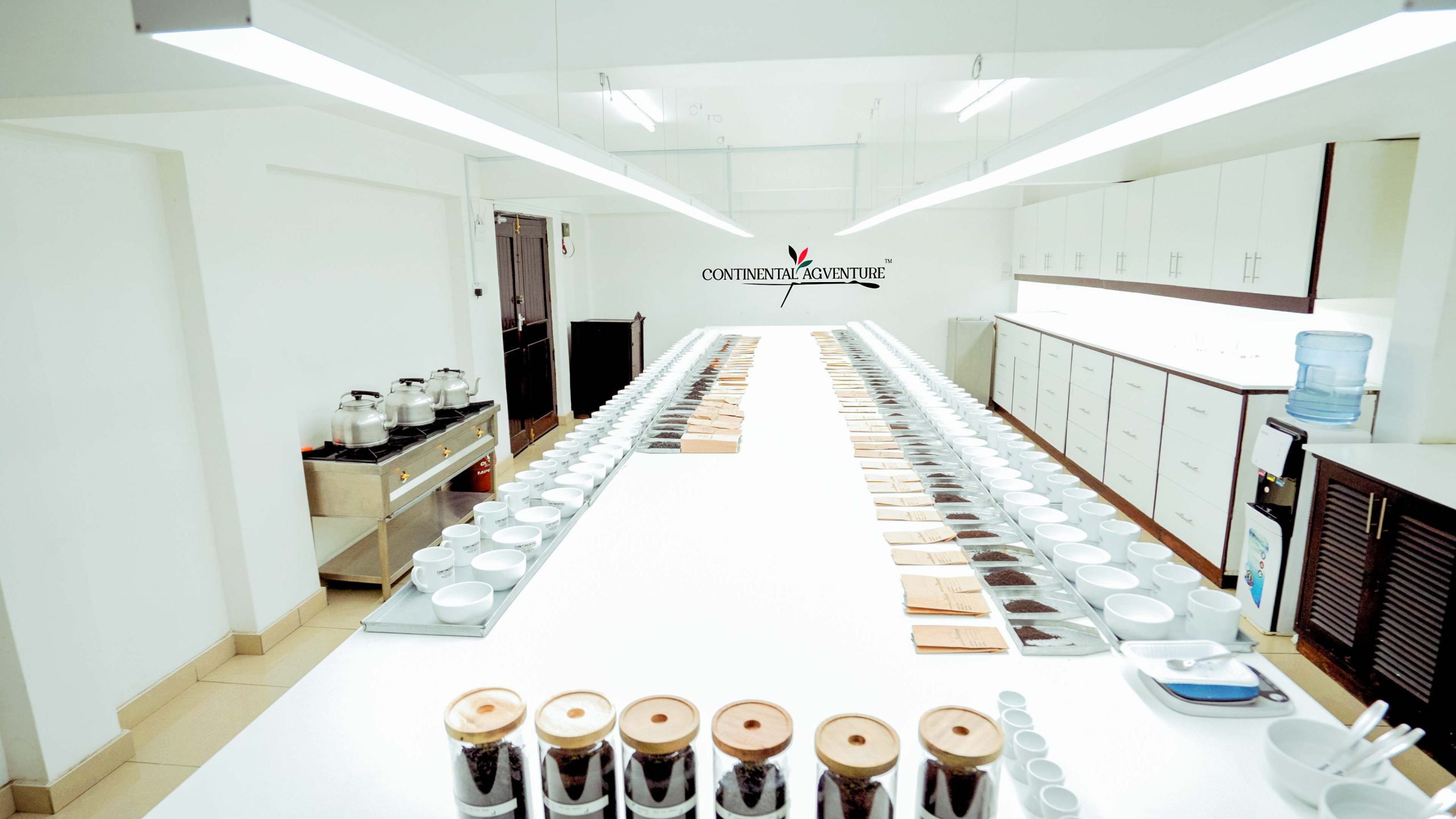 Tea cupping quality control laboratory testing Kenyan black tea export grade